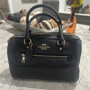 Black leather Coach purse